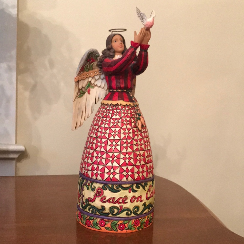 Jim Shore peace on earth figurine
